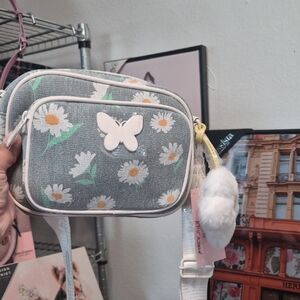 Betsey Johnson Gray Daisy Crossbody Bag with White Butterfly